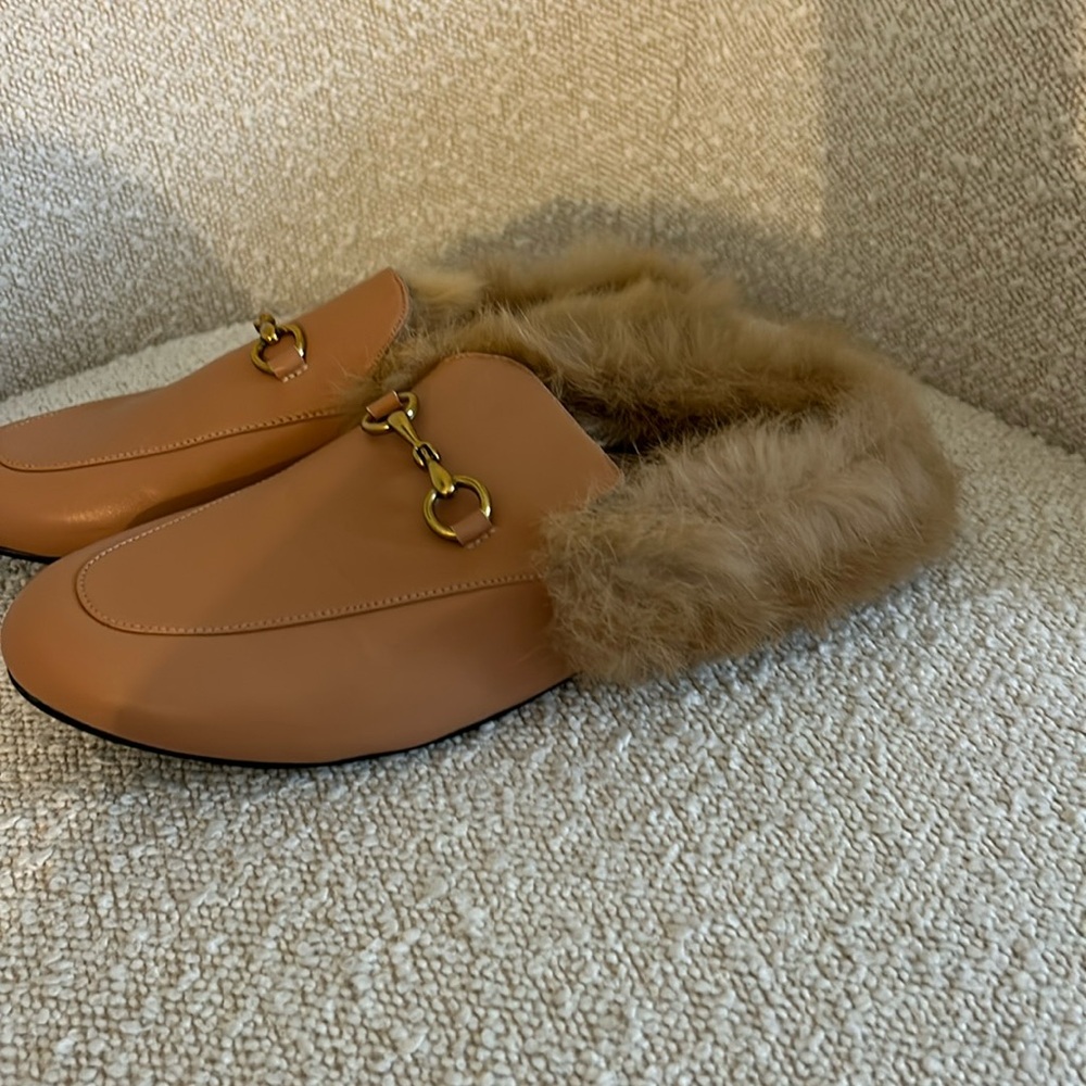 Fur lined mules with gold buckle
